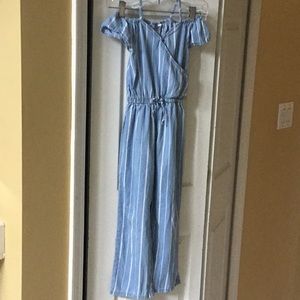Bebe size 7/8 Lt blue pinstripe jumpsuit